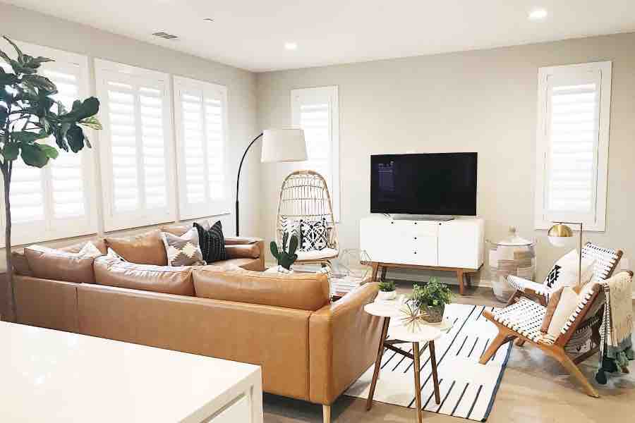 White Polywood shutters on living room windows