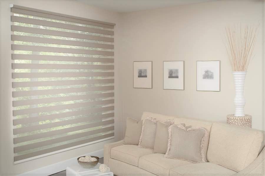 Zebra shades give you a unique combination of light control and style that benefits your Hartford home. Zebra shade allows filtered light into a living room